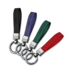 Portachiavi Tinta Unita Urban in PU in quattro colori: nero, blu, verde e rosso, con logo inciso